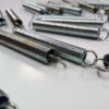 Push arm spring