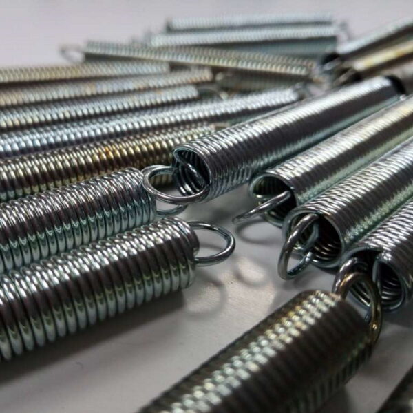 Push arm spring
