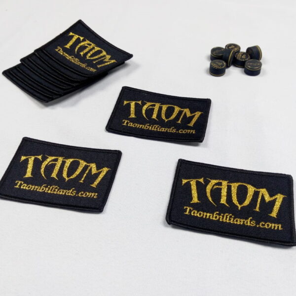 Taom Badge
